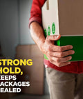 Person carrying box sealed with Scotch Sure Start Packing Tape Clear 1.88 In X 22.2 Yd 6 Dispenser Rolls Quiet Unwind Easy Start Strong Hold
