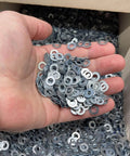Hand holding ✝️ uxcell 5 Pcs M8 Titanium Flat Washer Metric Flat Washer for Screw Bolt Nut Motor Maintenance Silver.