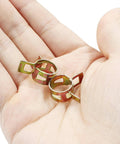50 Pack Spring Band Clamps Heavy Duty Metallic Hose Clips For 12.5 To 13 Mm Outer Diameter Hoses held in hand