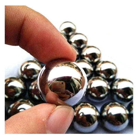 Close-up of Carbon Steel Bearing Balls,Precision Balls with polished finish, held by hand; 9mm to 20mm solid ball options visible