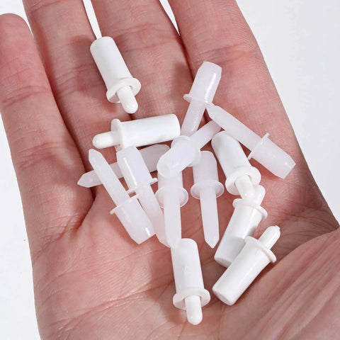 60 Pcs Shutter Repair Pins Shutter Louver Spring Loaded Replacement Pins on a hand, used for Plantation Shutters