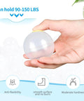 Close-up of hand holding a transparent ocean ball from 100 Ocean Balls for Babies Kids Children Soft Plastic Birthday Parties Events Playground Games Pool.
