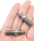 Hand holding One Quarter To Three Eighths Inch Tripod Screw Adapter Set For Camera Accessories, iron conversion screws, dual threads