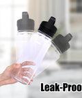 Person holding three Yonder water bottles with leak-proof lids, shown in clear plastic with dark-colored caps in focus.