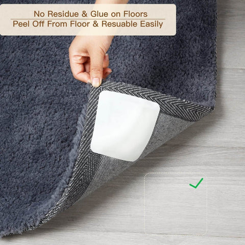 Person peeling back corner of rug to show Eight Piece Non Slip Rug Pad Grippers for Hardwood Floors underneath.