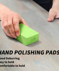 Hand polishing pad in use on wooden surface, labeled 400, from Six Piece Diamond Hand Polishing Pads Set 60 To 1000 Grit For Tile Glass Stone