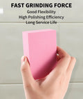 Close-up of a hand holding a pink pad from the Six Piece Diamond Hand Polishing Pads Set 60 to 1000 Grit for Tile Glass Stone.