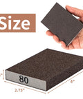 Hand holding an 80 grit sanding block from Eight Pack Hand Sanding Block Set Grits 60 80 120 220 For Wood Metal Drywall with dimensions shown