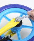 Using the 121 Piece Mechanic Tool Set With One Quarter And Three Eighth Inch Drive Sockets, Metric And Standard Wrenches, Bits, Hex Keys And More For Car, Home And Auto Repair on a blue bicycle wheel.