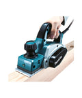 Three And A Quarter Inch Planer With Tool Case Six Point Five Amp Motor Delivers Fast Smooth Stock Removal For Professional Carpentry Woodworking And Framing Projects Including Window And Door Installations And Fine Finishing being used on wood surface.