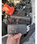 Automotive Relay Tester Kit 12V Handheld Diagnostic Tool for 4 and 5 Pin Relays with Battery Clips in a car engine bay