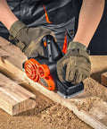 Person using powerful 710W handheld planer for 16500 RPM wood smoothing, chamfering, flush joints on wooden plank.