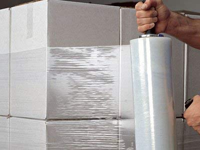 Extended Length Stretch Film Dispenser For 16 To 22 Inch Film Heavy Duty Aluminum Pallet Wrapper with Adjustable Tension Knob in use