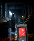 EMF Meter, Detects Electric and Magnetic Fields with LCD Display, Sound-Light Alarm in eerie room with caution tape and shadowy figure.