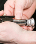 Hands adjusting 9-Inch Reversible Wire Twister Pliers with Auto Spring Loaded Return for Stainless Steel Safety Wire.
