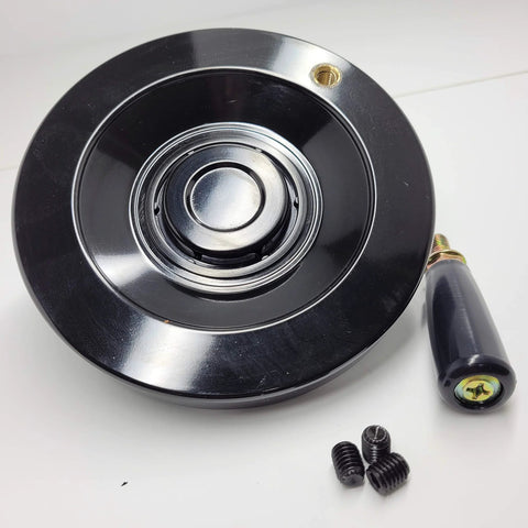 Black 5.5 Inch Heavy Duty Handwheel With One Half Inch Bore for drill press, featuring aluminum core and phenolic material.