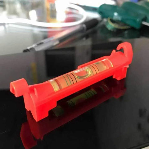 Side view of Seven Piece Hanging Bubble Line Level Set For Building Trades And Surveying Durable ABS Plastic Three Inch Length