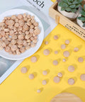 120 Piece Wood Plug Set For Screw Holes With Mushroom Head Shape on white plate, scattered on yellow surface, for furniture repair