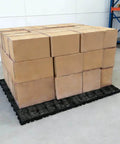 Plastic Pallet Safety Storage Nestable Grid Pads Two Pack HDPE Non Slip Platform in warehouse supporting boxes.