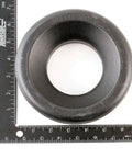 Heavy Duty Trailer Wheel Chock Donut for RVs Campers Boats and Trailers, 6 and a Quarter Inch Outer Diameter, 3 Inch Inner, High Density Polyethylene next to rulers