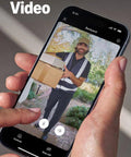 Battery Doorbell With Head To Toe Video For Home Or Business in use, showing head-to-toe video of a delivery person on a smartphone.
