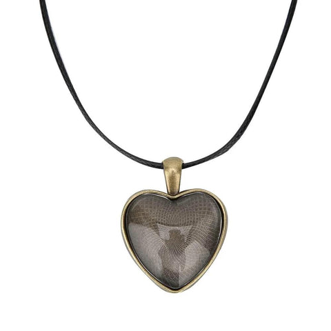 Heart-shaped pendant from DIY Necklace Making Kit With Base Tray Pendant Molds And 60pc Metal And Plastic Accessories, featuring a vintage look.
