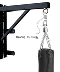Beefed Up Heavy Bag Spring Shock Absorber For Boxing And MMA Training Cuts Bag Swing And Noise By Up To Seventy Five Percent Keeps Your Mounts Safe Fits 75 To 220 Lb Bags Top Or Bottom Mount 4.6 Inch shown installed with heavy bag on wall bracket.