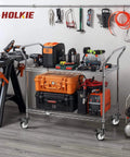 Heavy-duty cart with tools on 4 inch total locking stem caster wheels, steel housing, in workshop setting.