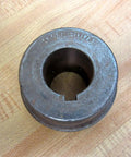Front view of a Heavy Duty 4SHSB Hub Assembly with Keyway for One and One Eighth Inch Shafts Rexnord Brand on wooden surface