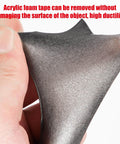 Close-up of Heavy Duty Double Sided Tape Waterproof Foam Mounting Tape 36.5 Ft Long 0.4 Inch Wide being stretched