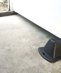 Heavy Duty Jumbo Door Wedge In Black For Home And Office Use Extra Grip Lip Non-Marking Hard Plastic With Large Footprint To Hold Rough Surfaces And Prevent Wall Damage