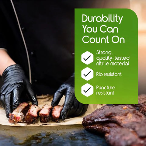 Person wearing Heavy Duty 6 Mil Black Nitrile Gloves Latex Free For Food Industry And Mechanics, handling cooked meat