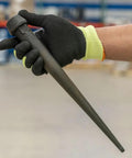 Person holding Heavy Duty Bull Pin For Alignment And Metalworking With Forged Heat Treated Broad Head 1 1/4 Inch Black Finish