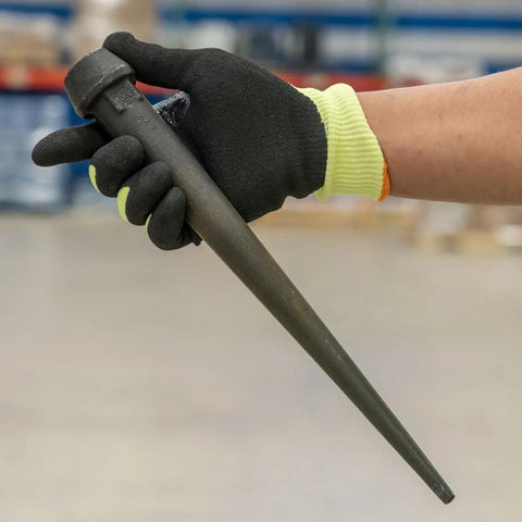 Person holding Heavy Duty Bull Pin For Alignment And Metalworking With Forged Heat Treated Broad Head 1 1/4 Inch Black Finish