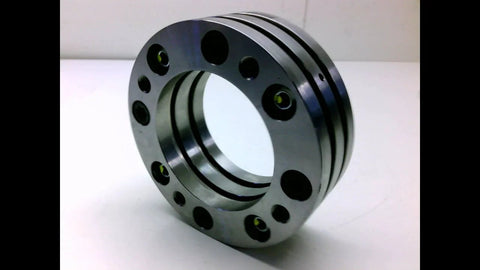 Drive Stock 9000-63-050 from Rexnord, used in good condition, heavy-duty drive component for industrial machinery, 8x8x6 in size.