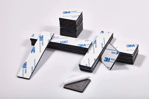 Heavy Duty No Fuss Double Sided Foam Tape Kit With Waterproof Adhesive Mounting Tape in square and rectangular pieces on display