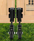 4.3 Inch Heavy Duty Gate Wheel With Spring Loaded Mechanism mounted on a wooden gate, hardware included, 2 Pack shown on grass
