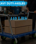 10 inch heavy duty pneumatic caster wheels set of 4 with rubber knobby tread on a heavy-duty cart carrying two boxes.