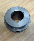 Heavy Duty 4SHSB Hub Assembly With Keyway For One And One Eighth Inch Shafts Rexnord Brand on a wooden surface