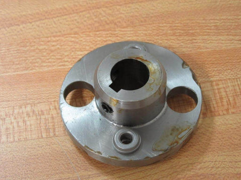Heavy Duty Hub For Shafts And Conveyors Built To Last With Two And A Half Inch Outer Diameter Five Eighth Inch Bore One Inch Width Ideal For Industrial Power Transmission And Pulleys Model 814412 Rexnord showing front view on wooden surface.