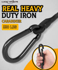 Close-up of iron carabiner from 8 Pack 12 Inch Heavy Duty Carabiner Bungee Cords With 190 Lbs Break Strength, shown with hand for scale