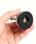 Hand holding Built Tough Heavy Duty Leveler Leg For Cabinets And Workbenches With 2.36 Inch Diameter Base, M12 Thread, PVC Coating