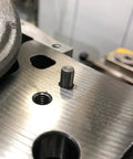 M5 x 40mm stainless steel dowel pin, cylindrical shelf peg on brushed metal surface