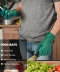 Person wearing Heavy Duty Nitrile Gloves 6 Mil Dark Green Diamond Texture while preparing food in a kitchen.