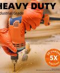 Close-up of orange-gloved hands using a drill, wearing 8 Mil Nitrile Powder Free Gloves Diamond Textured Heavy Duty Orange 100Pcs