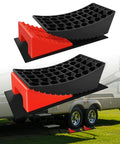 Heavy Duty RV Leveling Blocks for Travel Trailers With Anti Slip Mats and Chocks, 2 Pack Includes Carry Bag, 4 Inch Max Leveling Height, Works Up To 35000 Lbs GVW, Red by ROBLOCK, shown in use with travel trailer