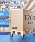 Heavy duty side mount caster wheels supporting 1200 lbs load on a pallet, featuring black swivel casters for furniture and carts.