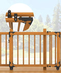 Image of Heavy Duty Sliding Gate Kit with Latch and Manual Universal Hardware for Wooden Gates Ideal for Backyard Patio Deck Stairway Hallway and Pet Safety with Smooth Quiet No Sag Operation installed on a wooden fence.