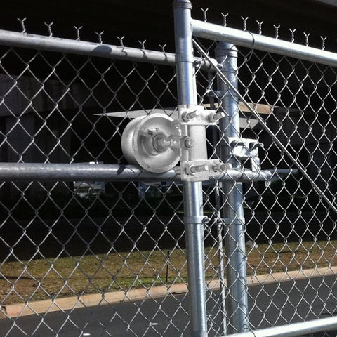 Sliding Gate Rollers Set With Five Inch Wheels For Two Inch Gate Frames And One And Five Eighths Inch Track Pipe Heavy Duty Malleable Iron Gate Hardware Two Pack With Double U Bolts Maintenance Free Durable And Smooth Operation installed on metal gate.