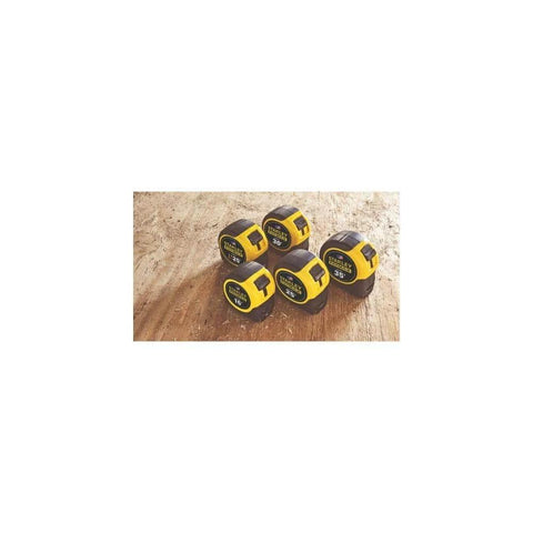 Five Heavy Duty Tape Measure, 25-Foot (33-725) on wooden surface, showing yellow high-impact cases and BladeArmor protection.